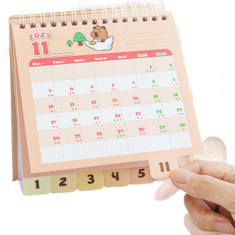 Capybara Desk Calendar 2026,Standing Flip Desktop Calendar from Jan 2026 to Dec 2026 - Metal Ring Twin-Wire Binding Monthly for Home Office School kid with Gashapon