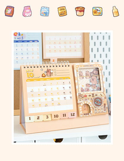 Capybara Desk Calendar 2026,Standing Flip Desktop Calendar from Jan 2026 to Dec 2026 - Metal Ring Twin-Wire Binding Monthly for Home Office School kid with Gashapon